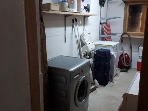 a laundry room with a washing machine in it at Gîte rénové à Mauvages avec jardin, BBQ et WIFI - FR-1-585-167 in Mauvages