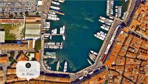 an aerial view of a marina with boats in the water at 2 Bedrooms central Saint-Tropez, next to the Port in Saint-Tropez