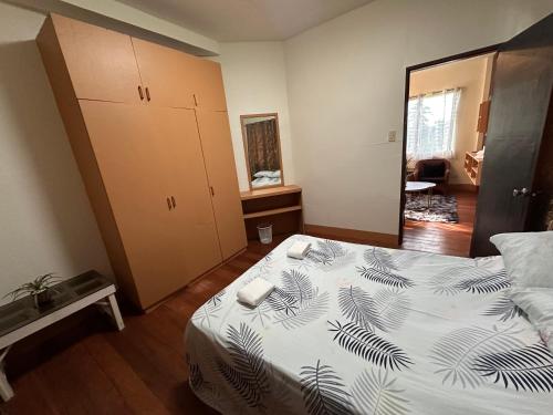 Postel nebo postele na pokoji v ubytování The RM Homestay