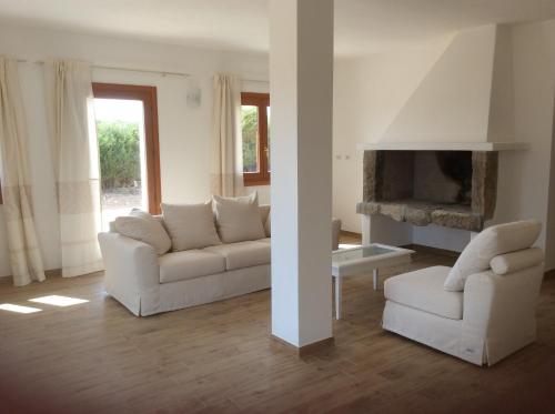 Area tempat duduk di Villa Stazzo Dell'Antica Trebbia