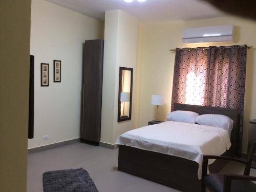 Cama o camas de una habitación en Sakan 275