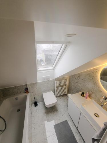 Ένα μπάνιο στο Ferienwohnung JP-Home