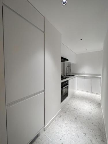 Η κουζίνα ή μικρή κουζίνα στο EHUB - Modern Rare 4-Bedroom APT, 50m from subway