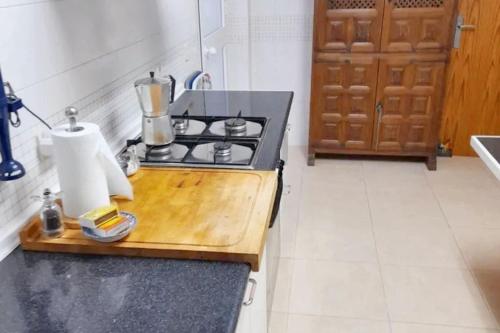 a kitchen with a stove and a counter top at Charming apartment in El Rompido with sea view in El Rompido