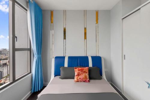 Ένα ή περισσότερα κρεβάτια σε δωμάτιο στο Saigon Home Apartment - Infinity Pool