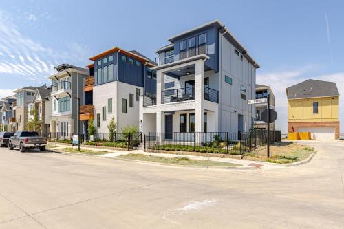 a row of houses on a city street at Modern 3br Lake House In Rowlett in Rowlett