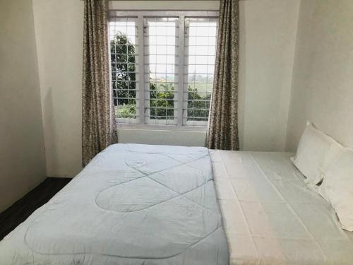 Postel nebo postele na pokoji v ubytování Clarion Home Stay Calvarymount