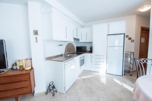 Køkken eller tekøkken på Apartamento primera linea de mar