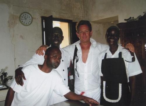 a group of men posing for a picture at Dhow House in Shela