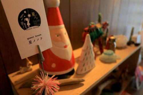 a close up of a christmas bottle on a counter at Hoshinosora in Shodoshima