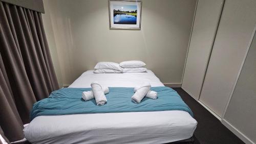 Postel nebo postele na pokoji v ubytování Bunbury Stay at Sanctuary Resort Strata