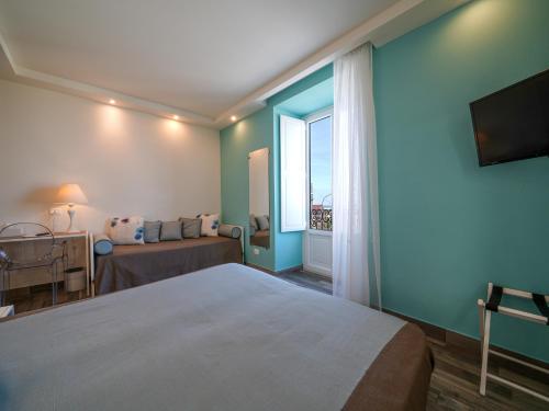 Ένα ή περισσότερα κρεβάτια σε δωμάτιο στο Villa Adua