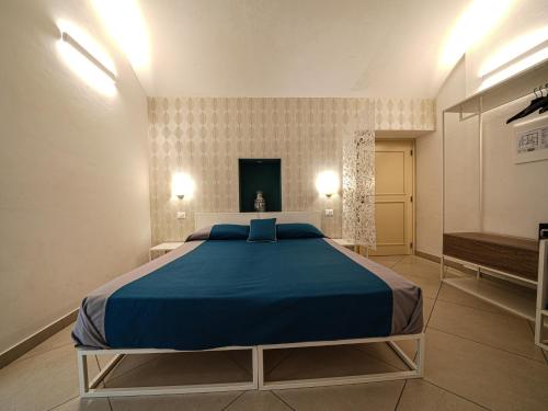 Ένα ή περισσότερα κρεβάτια σε δωμάτιο στο Villa Adua