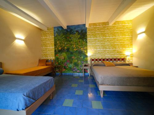 Ένα ή περισσότερα κρεβάτια σε δωμάτιο στο Villa Adua