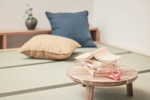 Ένα ή περισσότερα κρεβάτια σε δωμάτιο στο GrAce HOTEL HANEDA -こだま屋-