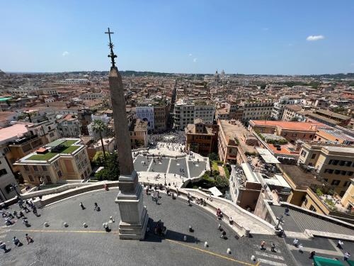 a view of a city with a monument in the center at Home Sweet Rome Lucina in Rome