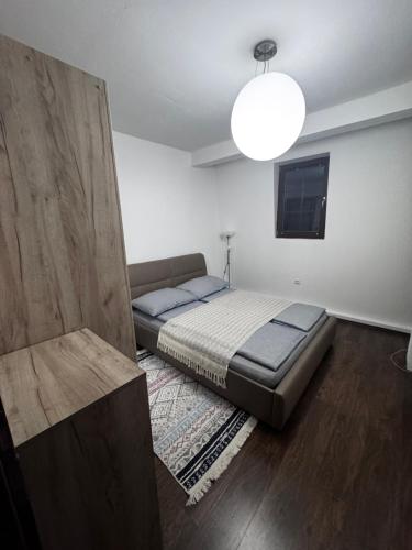 a bedroom with a bed in a room at Sweet Home Vlasic in Vlasic