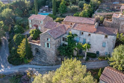 an aerial view of a large stone house at Mas de la Costete in Mons