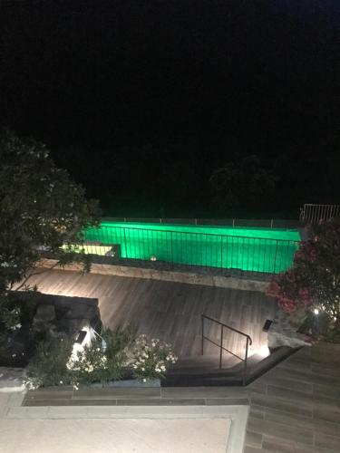 a green light on a skate park at night at Gîte A Funtana Montestremo, Balagne, Haute Corse in Manso