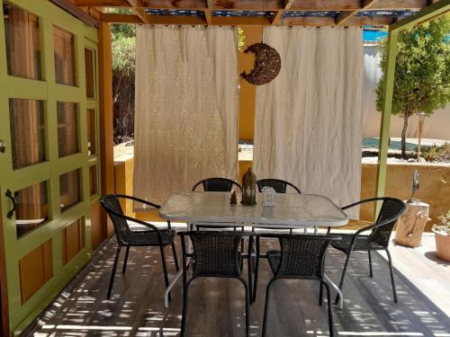 a table and chairs sitting on a patio at Casa Alma in Vicuña