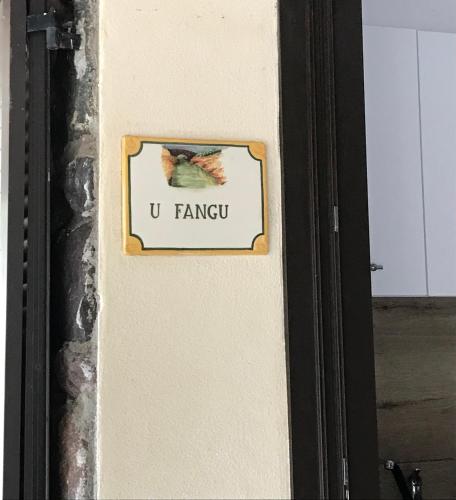 a sign on the side of a door with a bird on it at Gîte A Funtana Montestremo, Balagne, Haute Corse in Manso