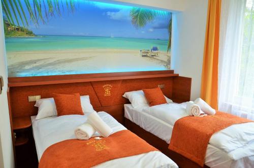 Postel nebo postele na pokoji v ubytování Hotelový resort Šikland