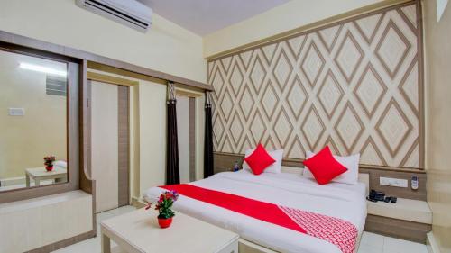 Postel nebo postele na pokoji v ubytování Hotel Neelam