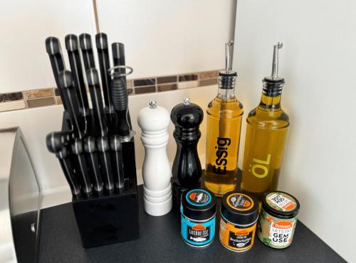 a counter with two bottles of alcohol on it at Refugium 2020 in Marienheide