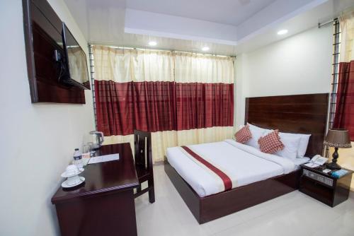 Postel nebo postele na pokoji v ubytování Hotel Ali Plaza
