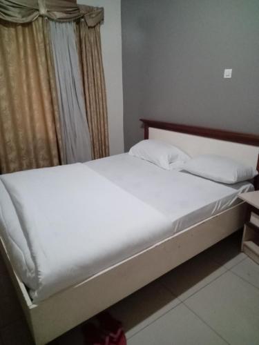 Una cama o camas en una habitación de Bed and breakfast remera