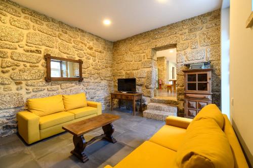 Χώρος καθιστικού στο Casa da Fândega