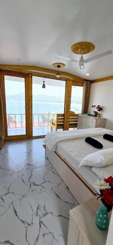 Letto o letti in una camera di Pacific Sunset View Palolem