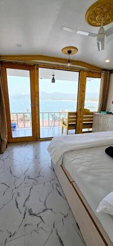 Letto o letti in una camera di Pacific Sunset View Palolem