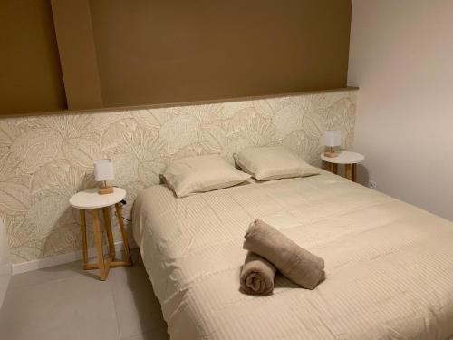 Ένα ή περισσότερα κρεβάτια σε δωμάτιο στο Le dortoir de la 13e