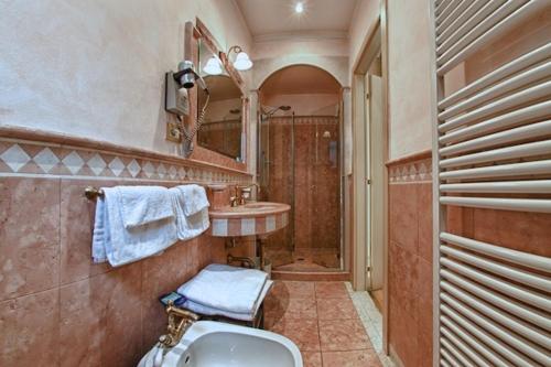 Koupelna v ubytování Hotel Pedrini