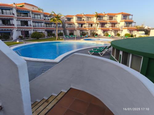 a view of a swimming pool in a resort at RELAX ISLEÑO in Breña Baja