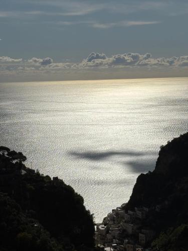 a view of a large body of water at Voce del Mare Apartment in Pontone