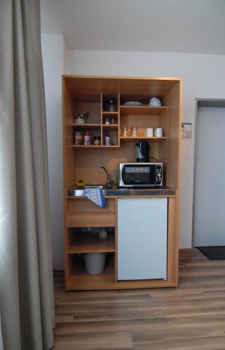 Petul Apart Hotel Residenzにあるキッチンまたは簡易キッチン