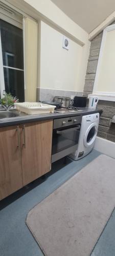 Η κουζίνα ή μικρή κουζίνα στο Greystones nawab sleep 6 C buxton in peak park