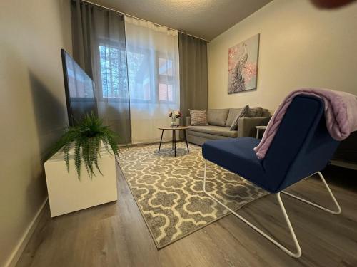 Χώρος καθιστικού στο Cozy two-room apartment with parking