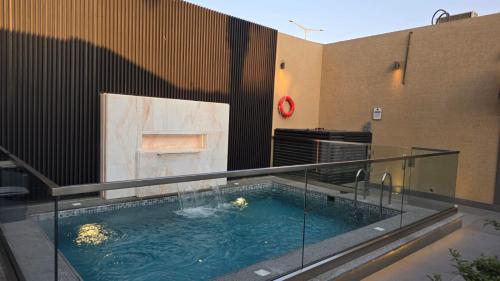 Bazén v ubytování lANTANA RESORTS منتجعات لانتانا nebo v jeho okolí