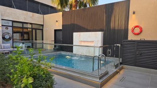Bazén v ubytování lANTANA RESORTS منتجعات لانتانا nebo v jeho okolí