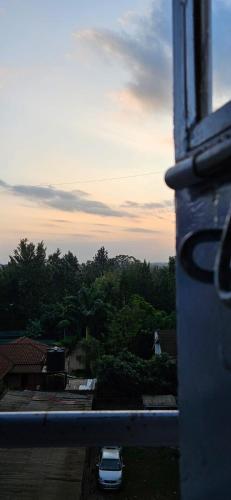 a view from a window of a car on a roof at Cozy Haven in Juja