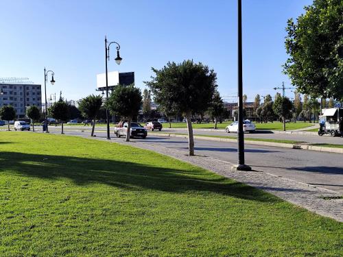 a shadow of a light pole on a street at Beautiful home in Tangier Beau Site Parking in Tangier