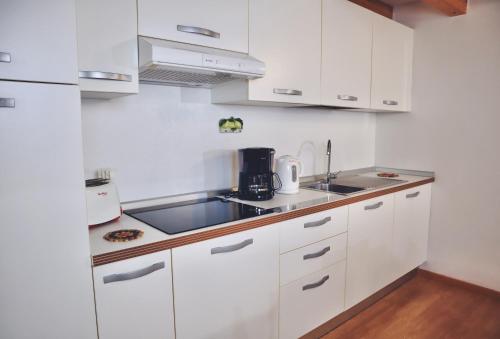 Kuchyň nebo kuchyňský kout v ubytování Windshouse Apartments