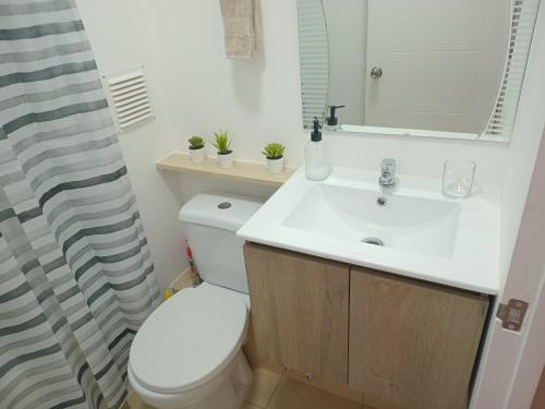 Ванная комната в Dpto Nuevo, Full Equipado, 2D 1B, Céntrico, Mirador del Bio Bio, a minutos del Aeropuerto, Mall, Excelente Conectividad