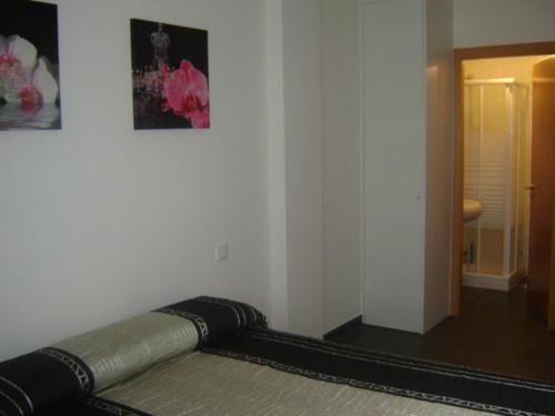 Katil atau katil-katil dalam bilik di Apartamento Viveiro, Terraza, 2 dormitorios 2 baños, piscina, parking, tenis