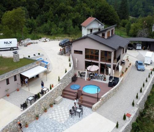 an aerial view of a house with a swimming pool at Josanica Bed&Breakfast in Konjic