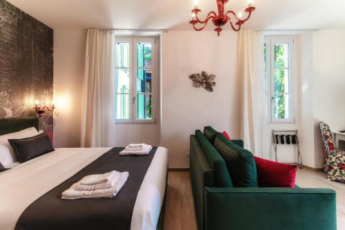 Una cama o camas en una habitación de Hotel Ristorante La Vignetta Cernobbio