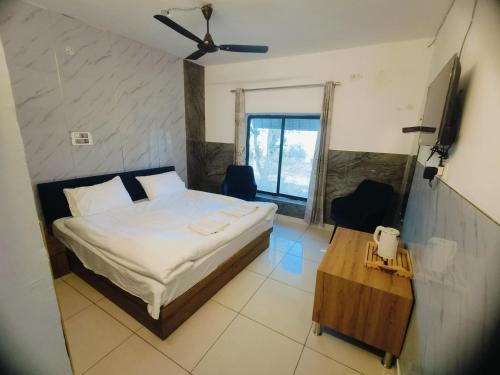 Voodi või voodid majutusasutuse Pong Retreat toas